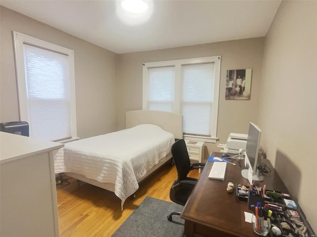 bedroom featuring light wood-type flooring