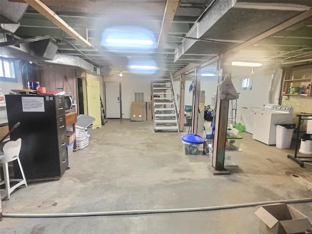 basement featuring washing machine and dryer