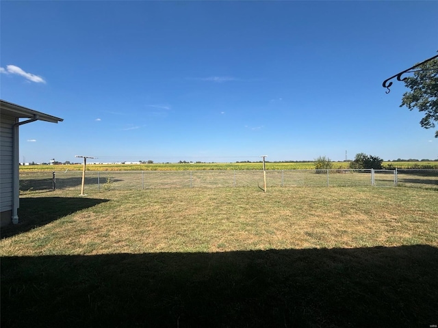 view of yard with a rural view