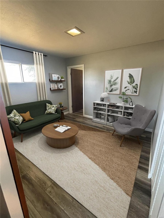 living room with dark wood-type flooring