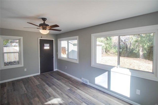 foyer entrance featuring hardwood / wood-style floors and ceiling fan