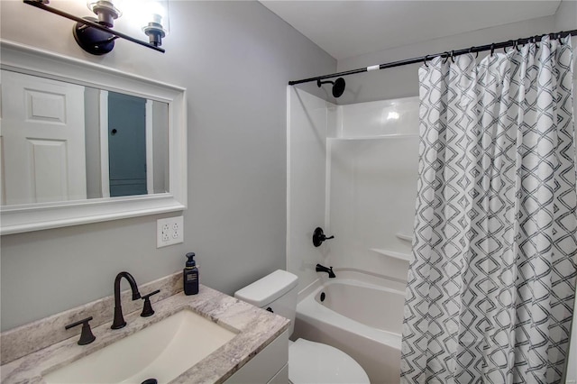 full bathroom featuring toilet, shower / tub combo, and vanity