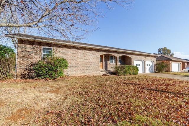 ranch-style home with a garage