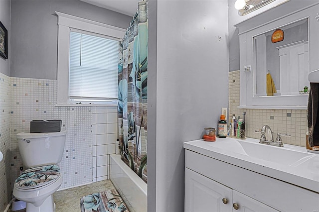 full bathroom featuring tile walls, vanity, shower / bath combination with curtain, and toilet