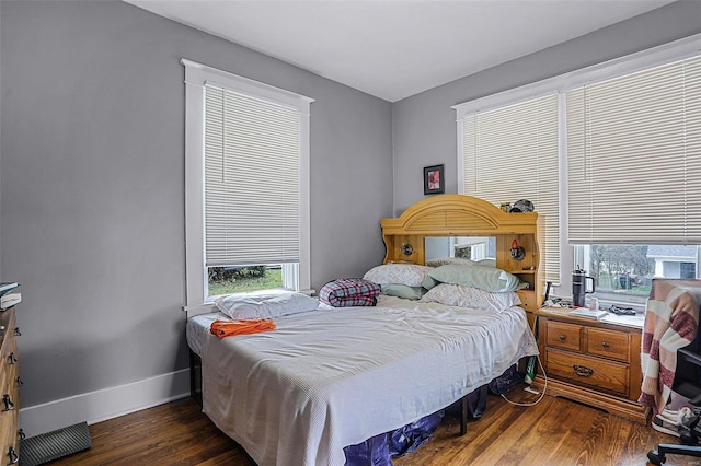 bedroom featuring dark hardwood / wood-style floors