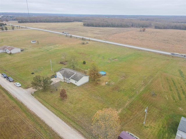 birds eye view of property featuring a rural view