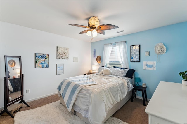 bedroom with visible vents, ceiling fan, baseboards, and carpet