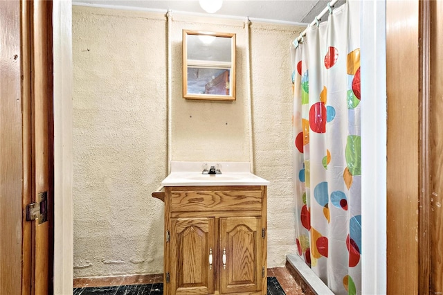 bathroom with a shower with curtain and vanity