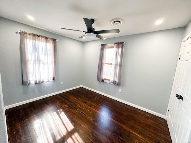 unfurnished room featuring ceiling fan and wood-type flooring