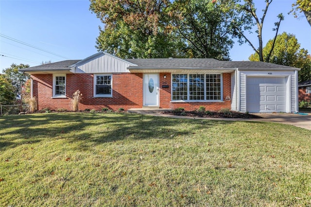 ranch-style home featuring a garage and a front lawn