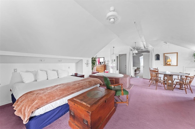 carpeted bedroom with vaulted ceiling