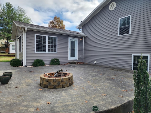 view of patio / terrace featuring a fire pit