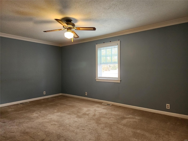 carpeted spare room featuring a textured ceiling, ceiling fan, and ornamental molding