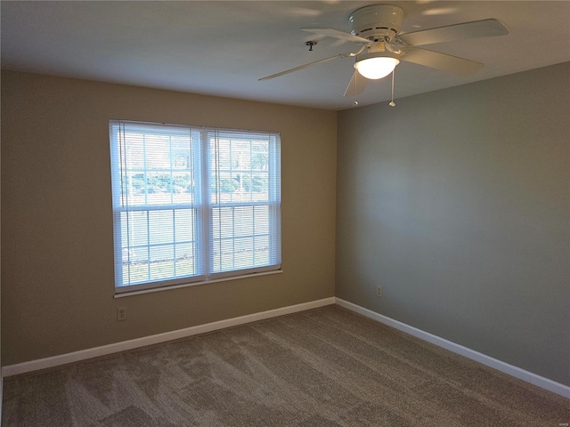 carpeted empty room with ceiling fan