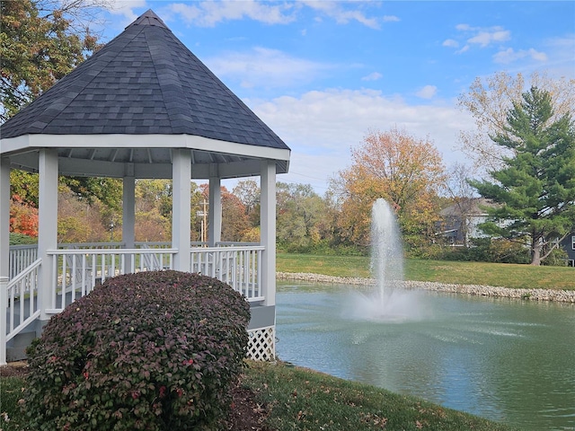 exterior space with a gazebo and a water view