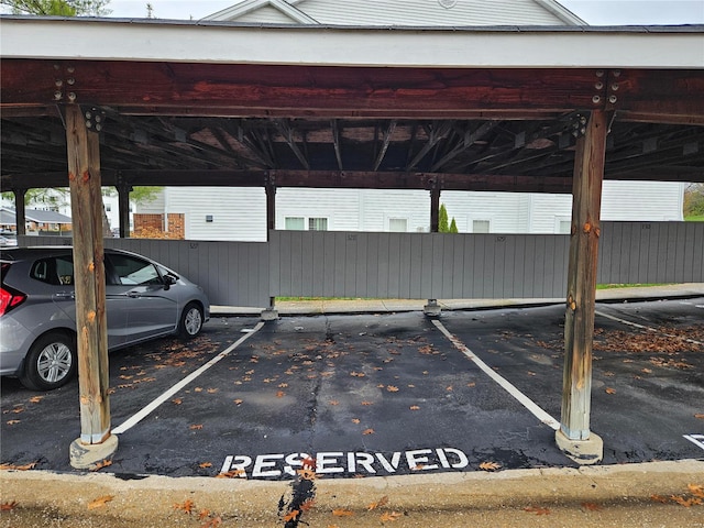 view of vehicle parking featuring a carport