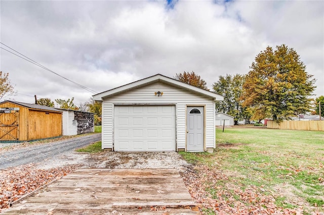 garage with a lawn