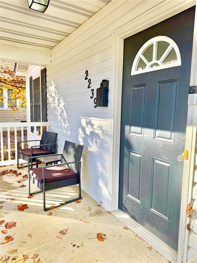 entrance to property with covered porch