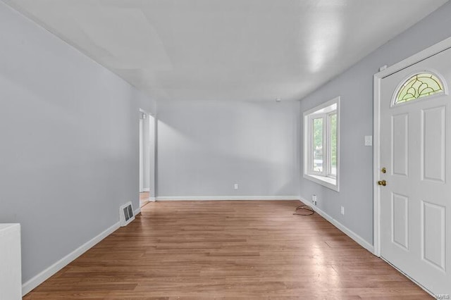 entrance foyer featuring light wood-type flooring