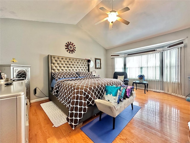 bedroom featuring wood-type flooring, ceiling fan, and vaulted ceiling