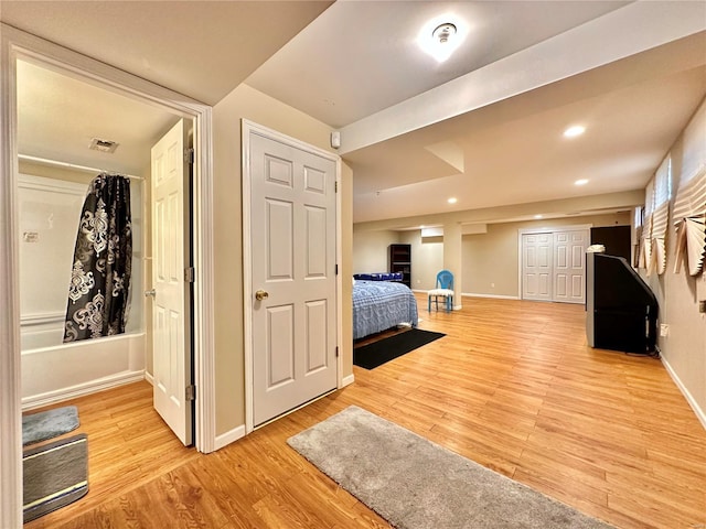 unfurnished bedroom with light hardwood / wood-style floors