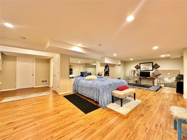 bedroom featuring light wood-type flooring