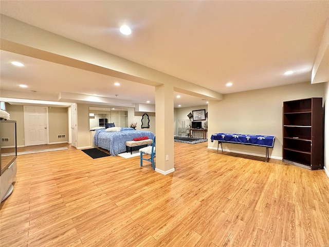 bedroom with light wood-type flooring