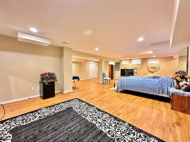 bedroom featuring light hardwood / wood-style floors