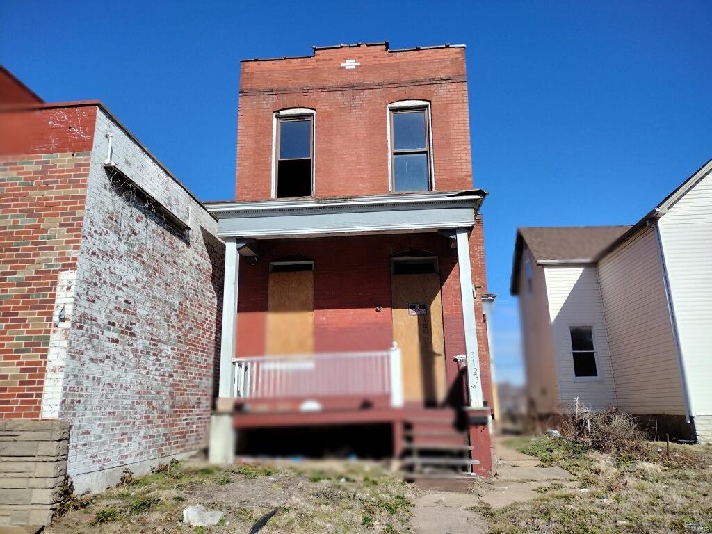 exterior space featuring covered porch