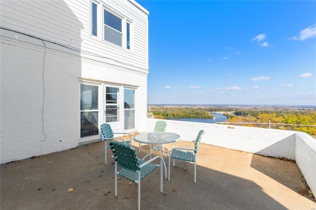 view of patio / terrace featuring a water view