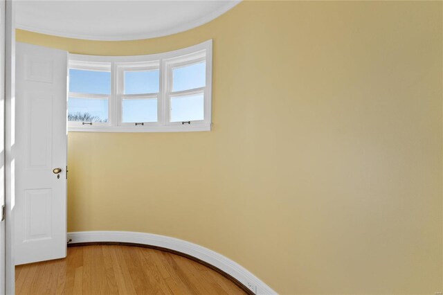 spare room featuring hardwood / wood-style flooring