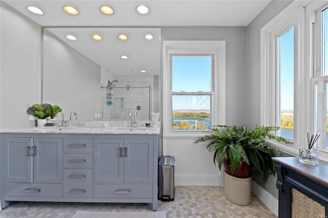 bathroom with vanity and an enclosed shower