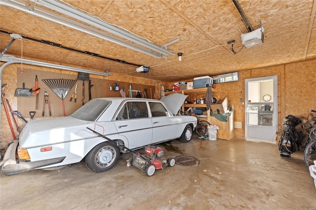 garage featuring a garage door opener