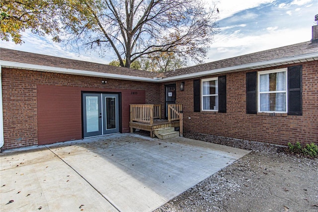 back of house with a patio area