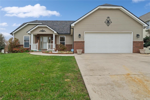 view of front of house with a garage and a front yard