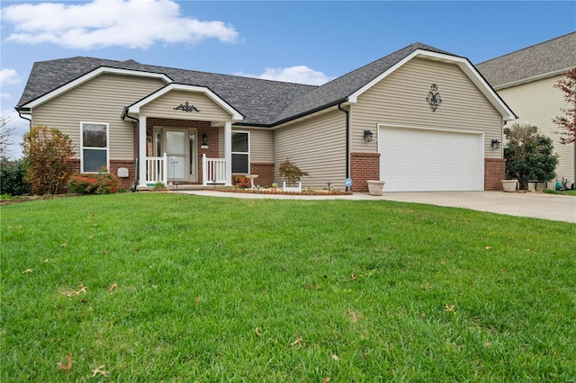 view of front facade with a garage and a front yard