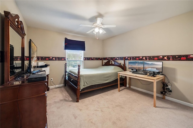 bedroom featuring light carpet and ceiling fan