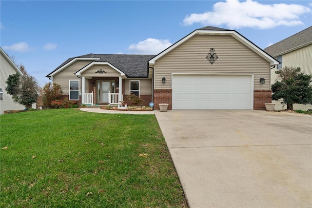 view of front of house with a porch, a garage, and a front lawn