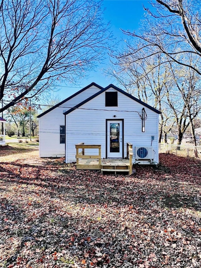 view of outbuilding featuring ac unit