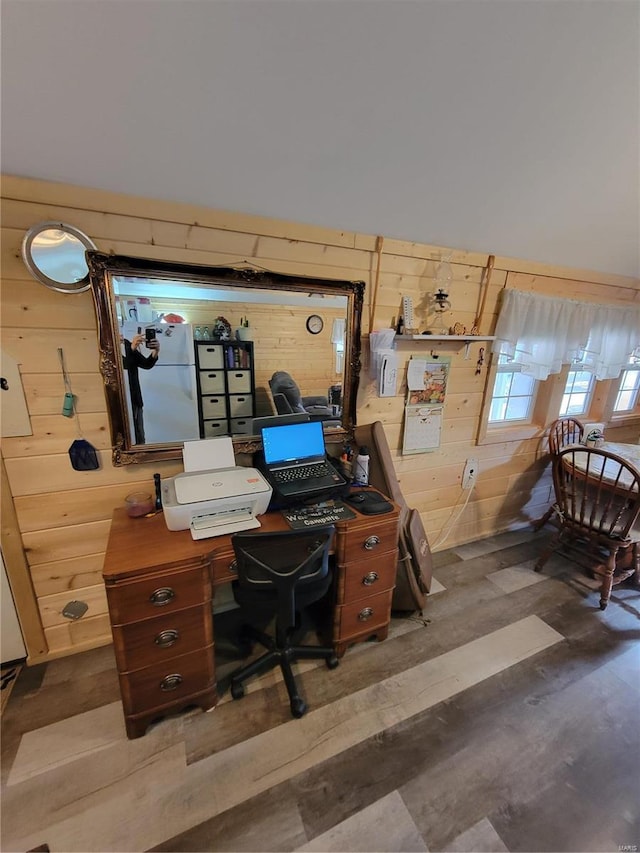 office space featuring wooden walls