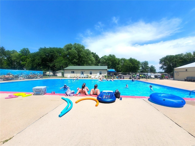 view of pool featuring a patio area