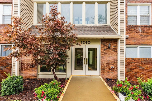 property entrance featuring french doors