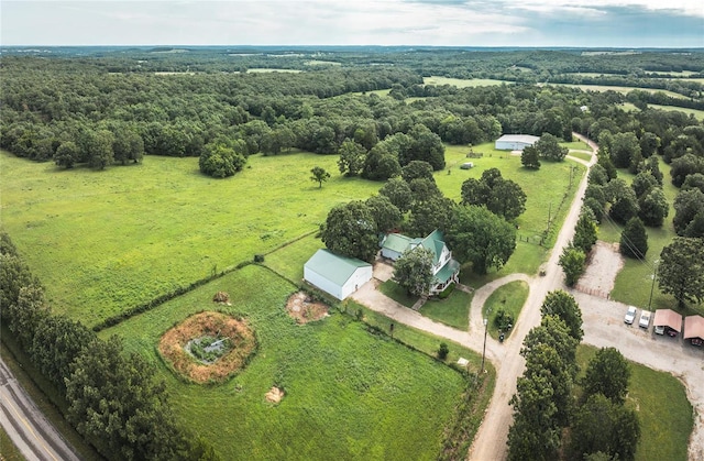 birds eye view of property with a rural view