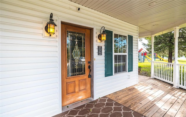 doorway to property with covered porch