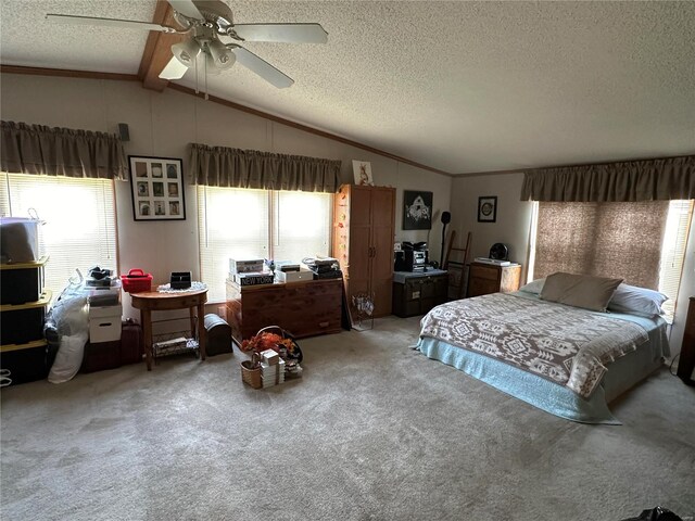 carpeted bedroom featuring ceiling fan, a textured ceiling, vaulted ceiling with beams, and ornamental molding