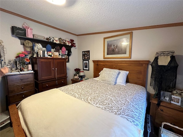 bedroom with a textured ceiling and crown molding