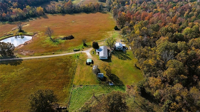 birds eye view of property featuring a water view and a rural view