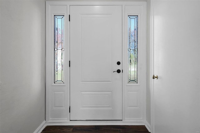 foyer entrance featuring dark hardwood / wood-style floors