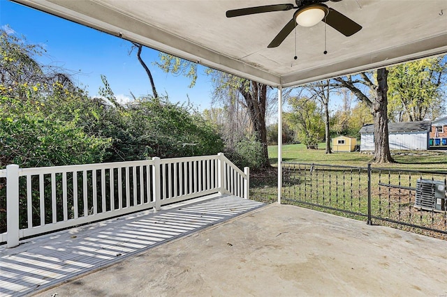 view of patio / terrace with ceiling fan and cooling unit