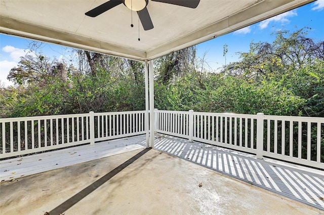 view of patio with a deck and ceiling fan